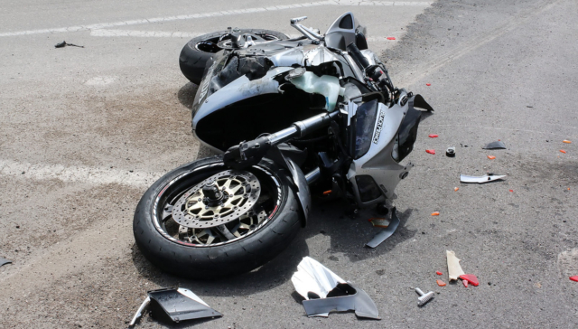 Traffic Accident Between A Car And A Motorcycle